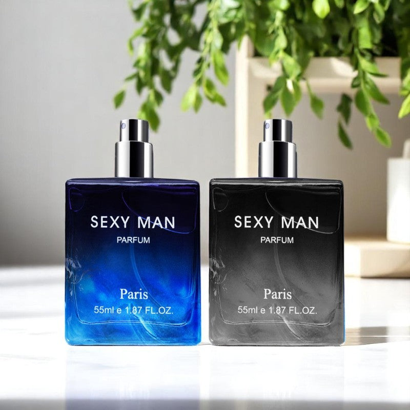 Two flat men's parfum bottles in blue and black with silver sprayers on a marble surface