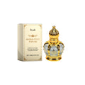 Ornate gold Roxelis Arabian style perfume oil bottle beside its cream and gold box